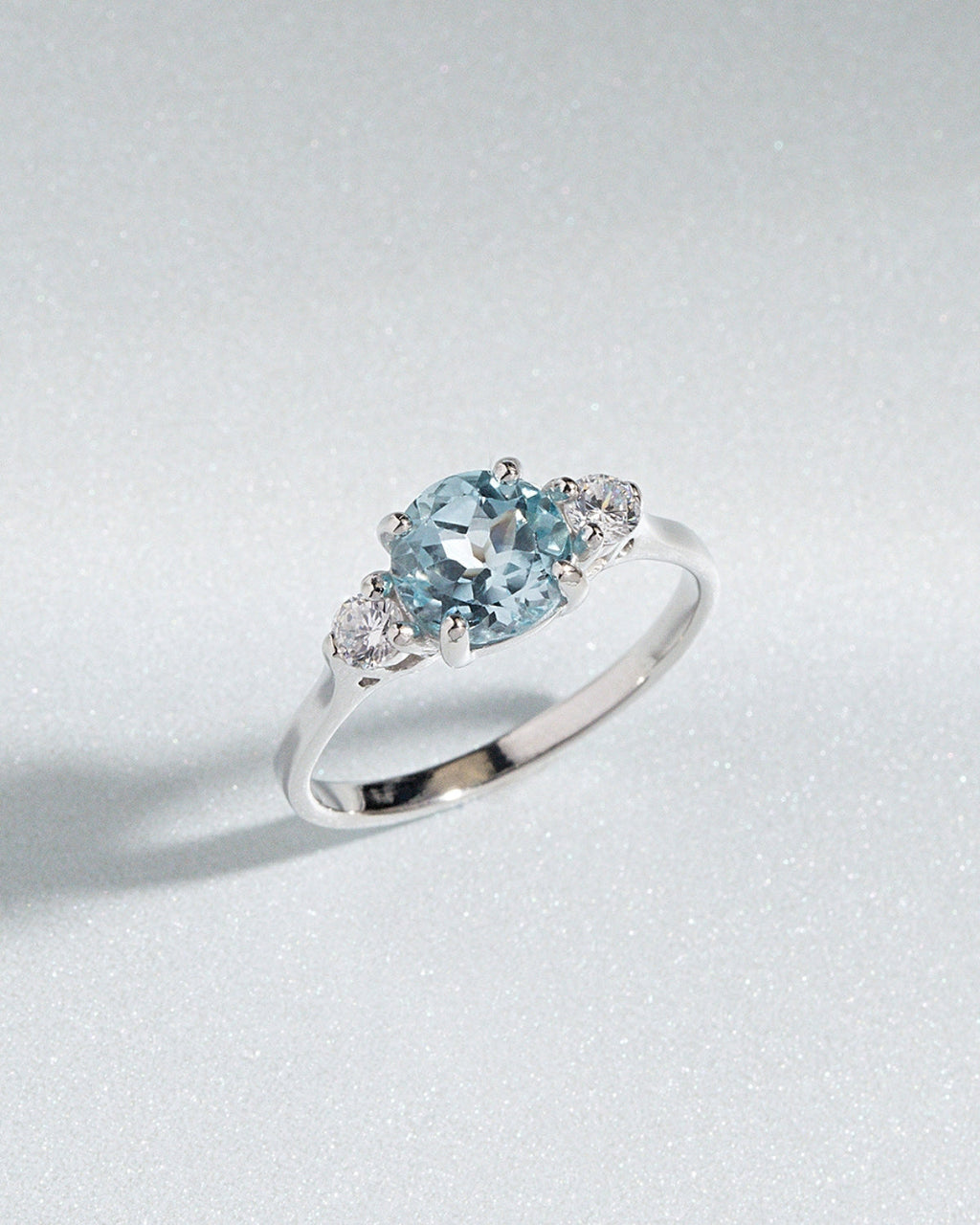 Blue Topaz Three Stone Ring in Sterling Silver