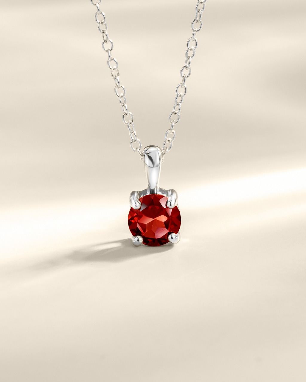 Garnet Solitaire Pendant Necklace in Sterling Silver