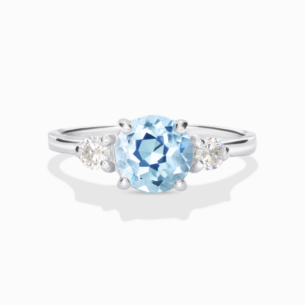 Blue Topaz Three Stone Ring in Sterling Silver