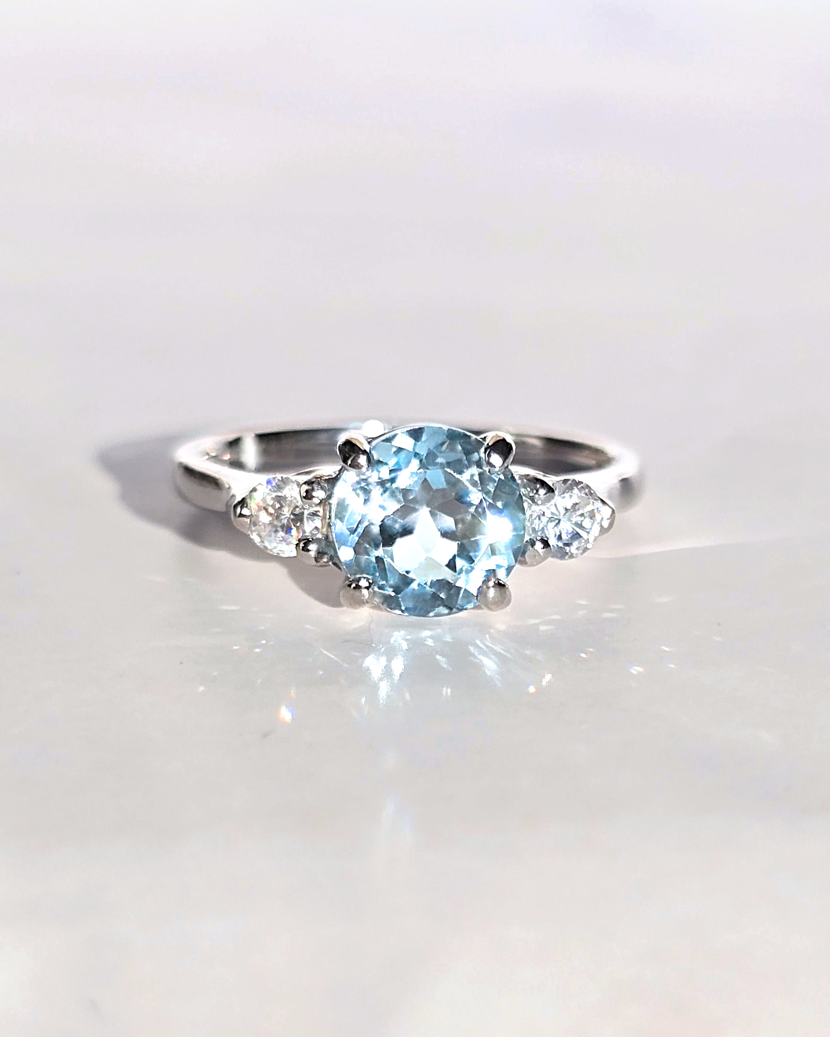 Blue Topaz Three Stone Ring in Sterling Silver